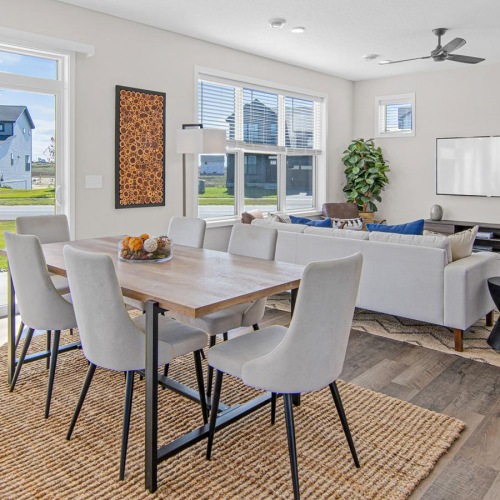 a large room with a table and chairs